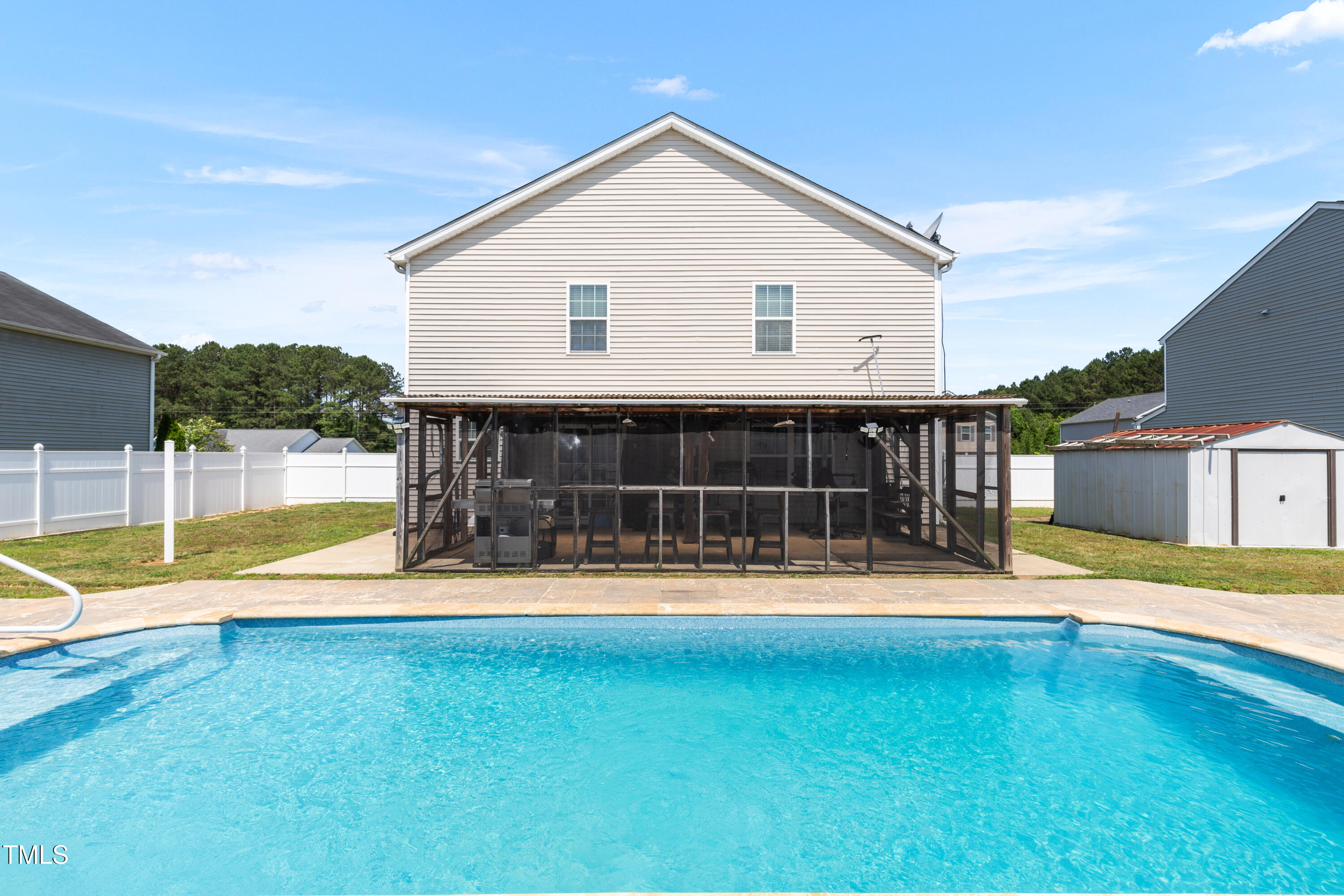 131 Botanical Court Bunnlevel, NC 28323 - Photo 15 of 18 a view of a house with swimming pool and yard