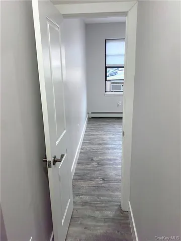 a view of a hallway with front door