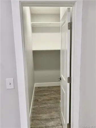 a view of entryway with wooden floor