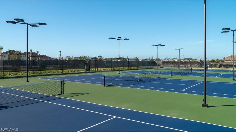 11391 Canopy Loop Fort Myers, FL 33913 - Photo 43 of 43 View of tennis court featuring community basketball court and fence