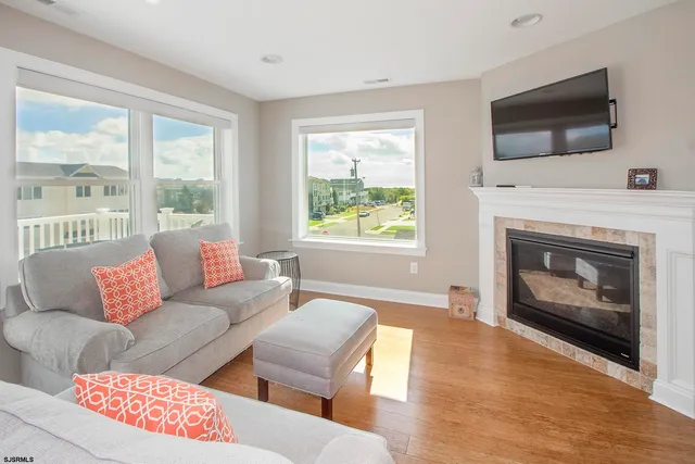 a spacious bedroom with a large bed and a large window