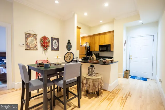 a view of a dining room with furniture