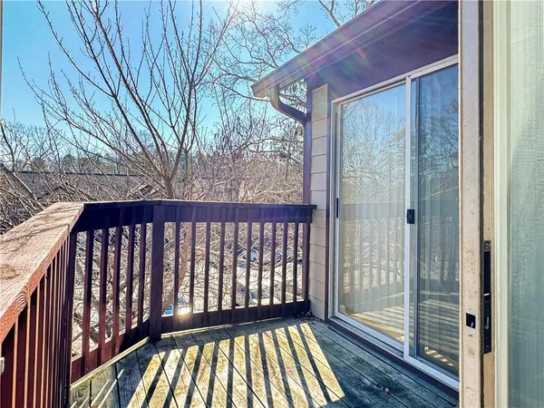 a view of outdoor space with deck and yard