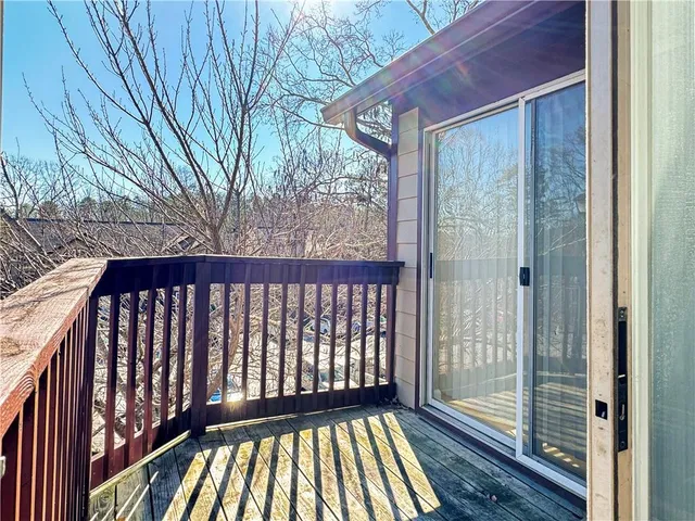 a view of outdoor space with deck and yard