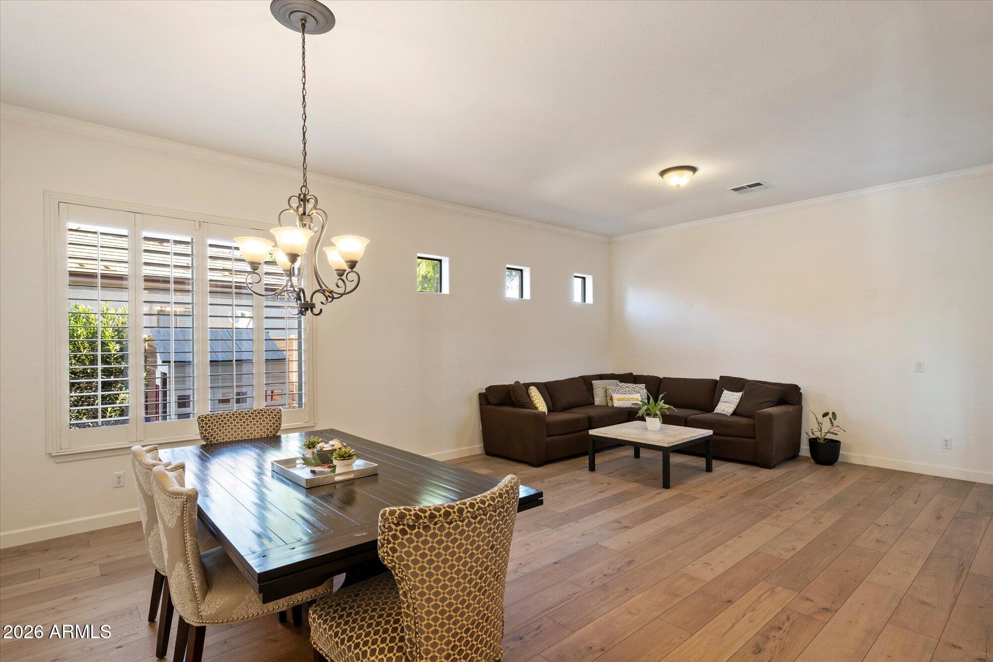 3118 South Colonial Street Gilbert, AZ 85295 - Photo 14 of 38 a view of a livingroom with furniture and window
