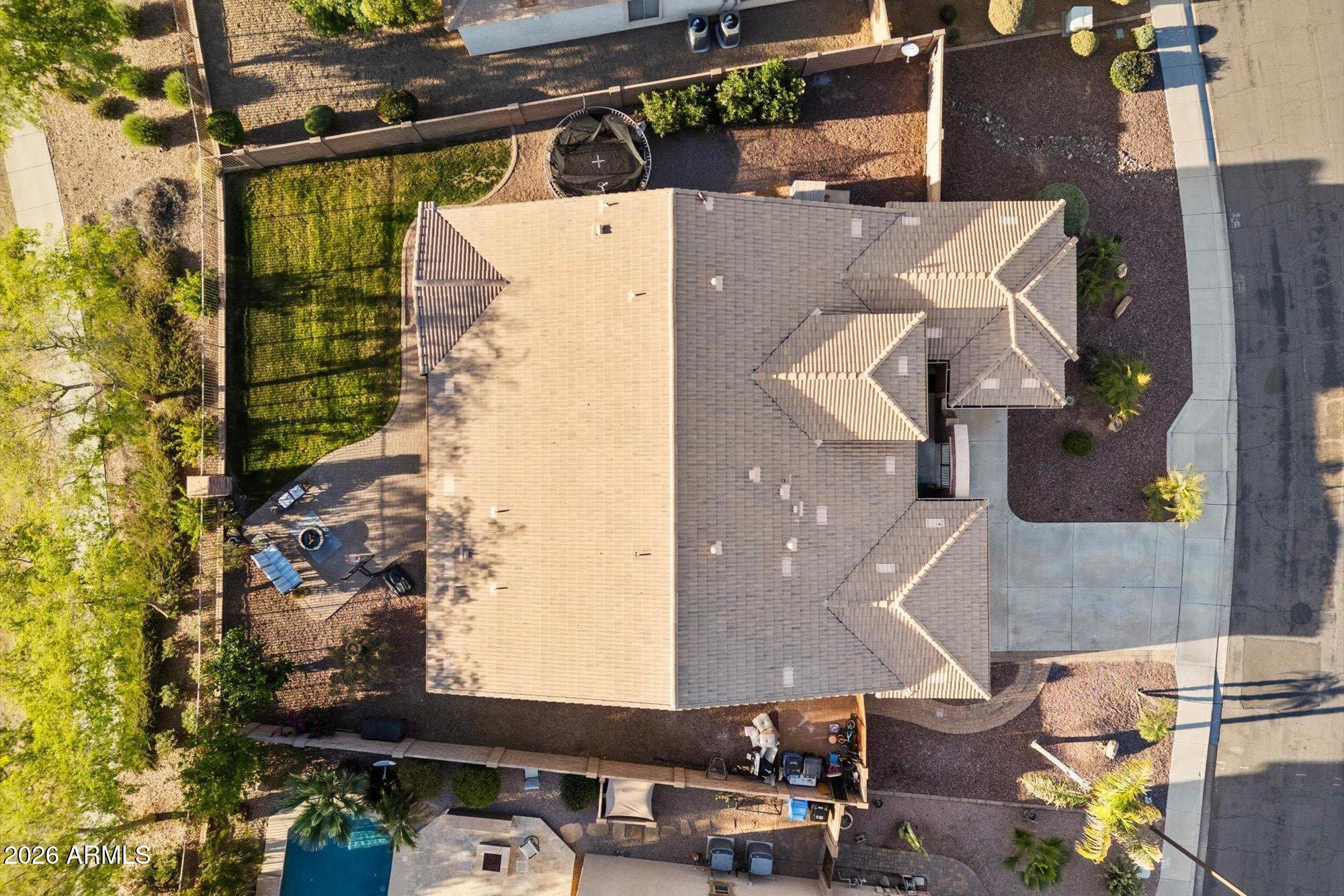 3118 South Colonial Street Gilbert, AZ 85295 - Photo 9 of 38 an aerial view of residential houses with outdoor space