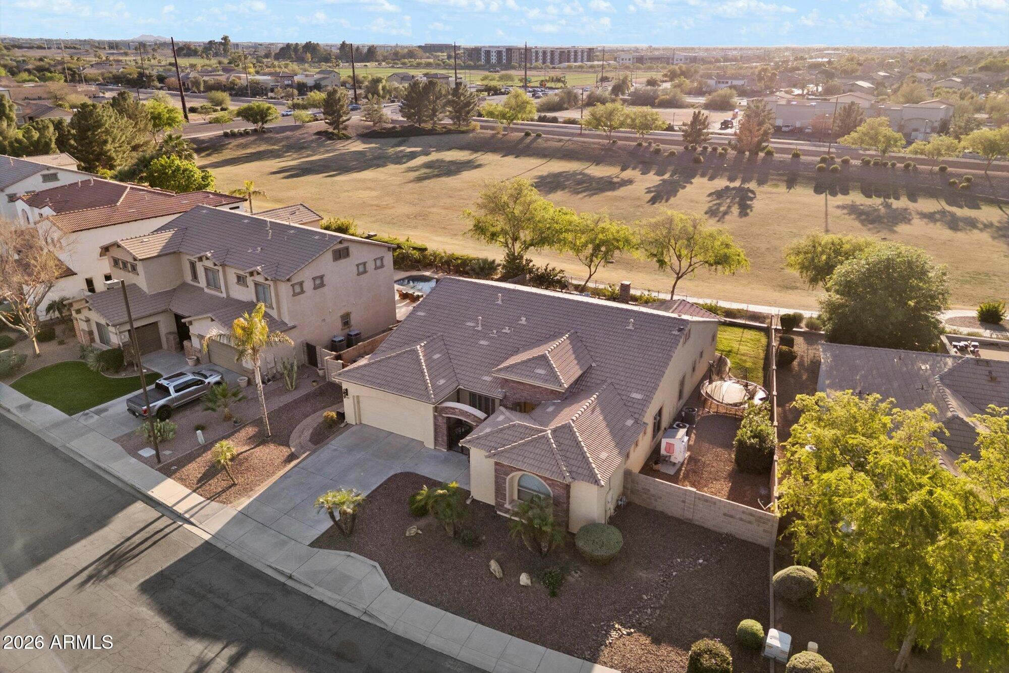 3118 South Colonial Street Gilbert, AZ 85295 - Photo 10 of 38 an aerial view of residential houses with outdoor space