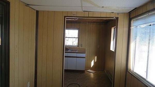 74 Lakeshore Drive Ashburnham, MA 01430 - Photo 15 of 27 a view of a closet and wooden door