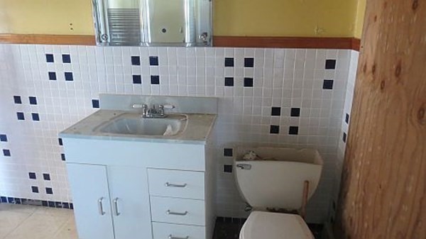 74 Lakeshore Drive Ashburnham, MA 01430 - Photo 17 of 27 a bathroom with a sink a toilet and shower