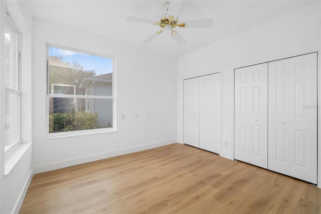 11022 Pine Lilly Place Lakewood Ranch, FL 34202 - Photo 44 of 61 a view of an empty room with a window
