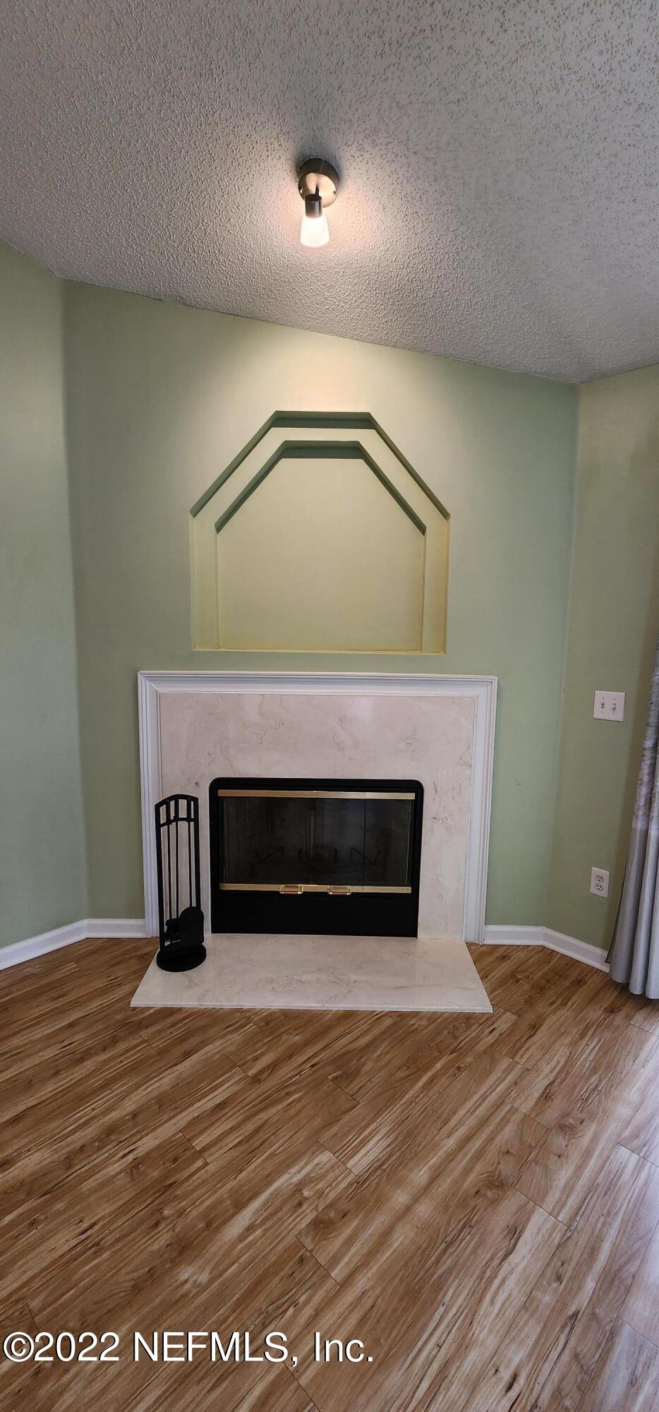 1641 Spring Oaks Lane Jacksonville, FL 32221 - Photo 22 of 40 a view of livingroom with furniture and wooden floor