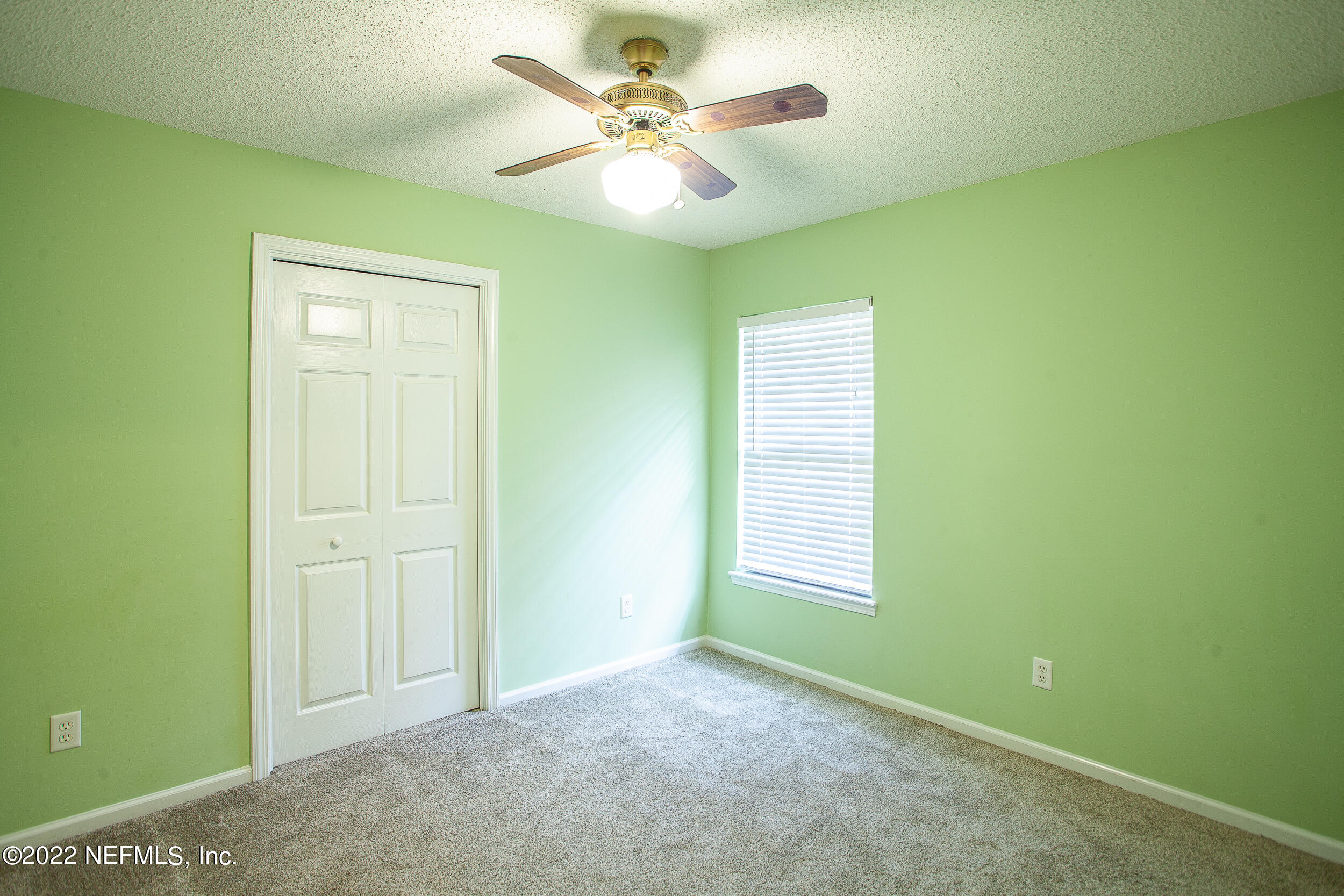 1641 Spring Oaks Lane Jacksonville, FL 32221 - Photo 25 of 40 a view of an empty room with a window