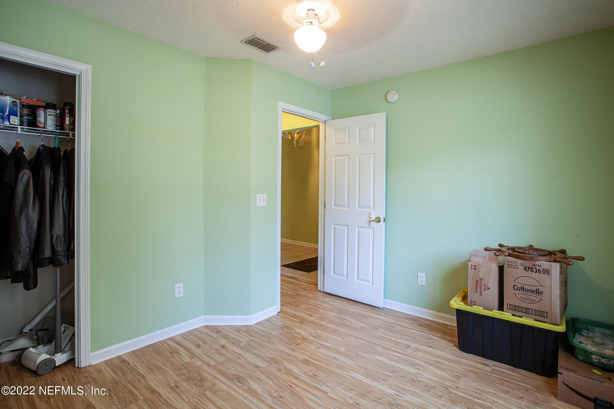 1641 Spring Oaks Lane Jacksonville, FL 32221 - Photo 30 of 40 a view of a room with wooden floor and closet