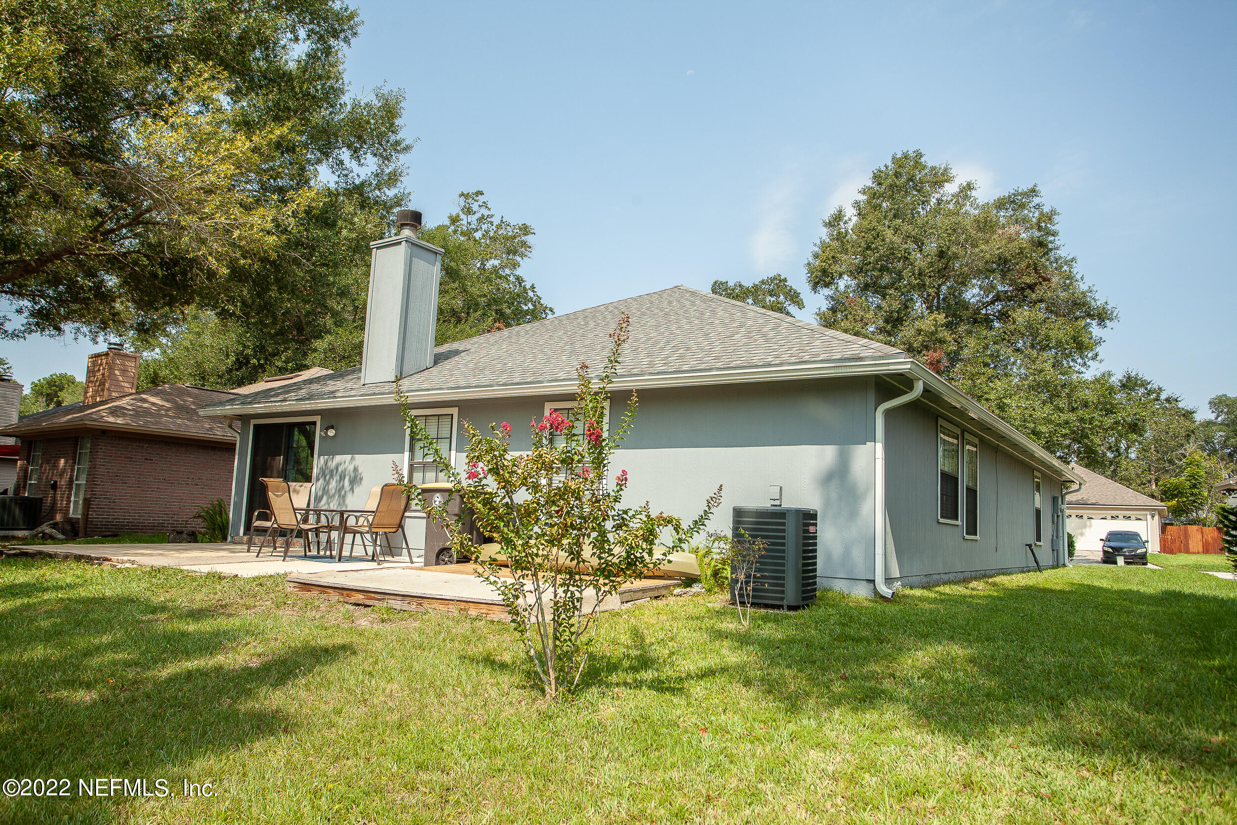 1641 Spring Oaks Lane Jacksonville, FL 32221 - Photo 31 of 40 a front view of a house with patio