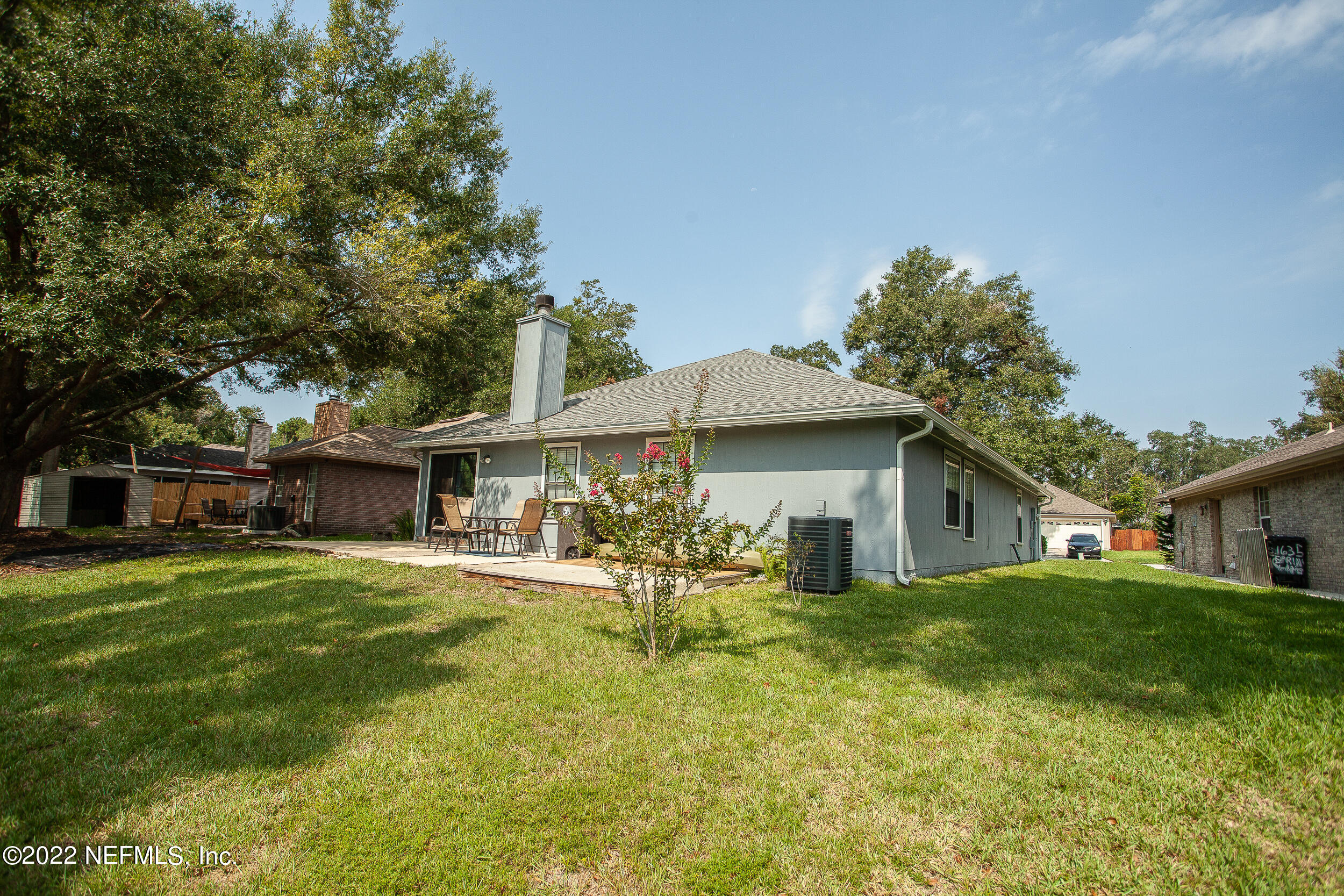 1641 Spring Oaks Lane Jacksonville, FL 32221 - Photo 34 of 40 a house view with a sitting space and garden