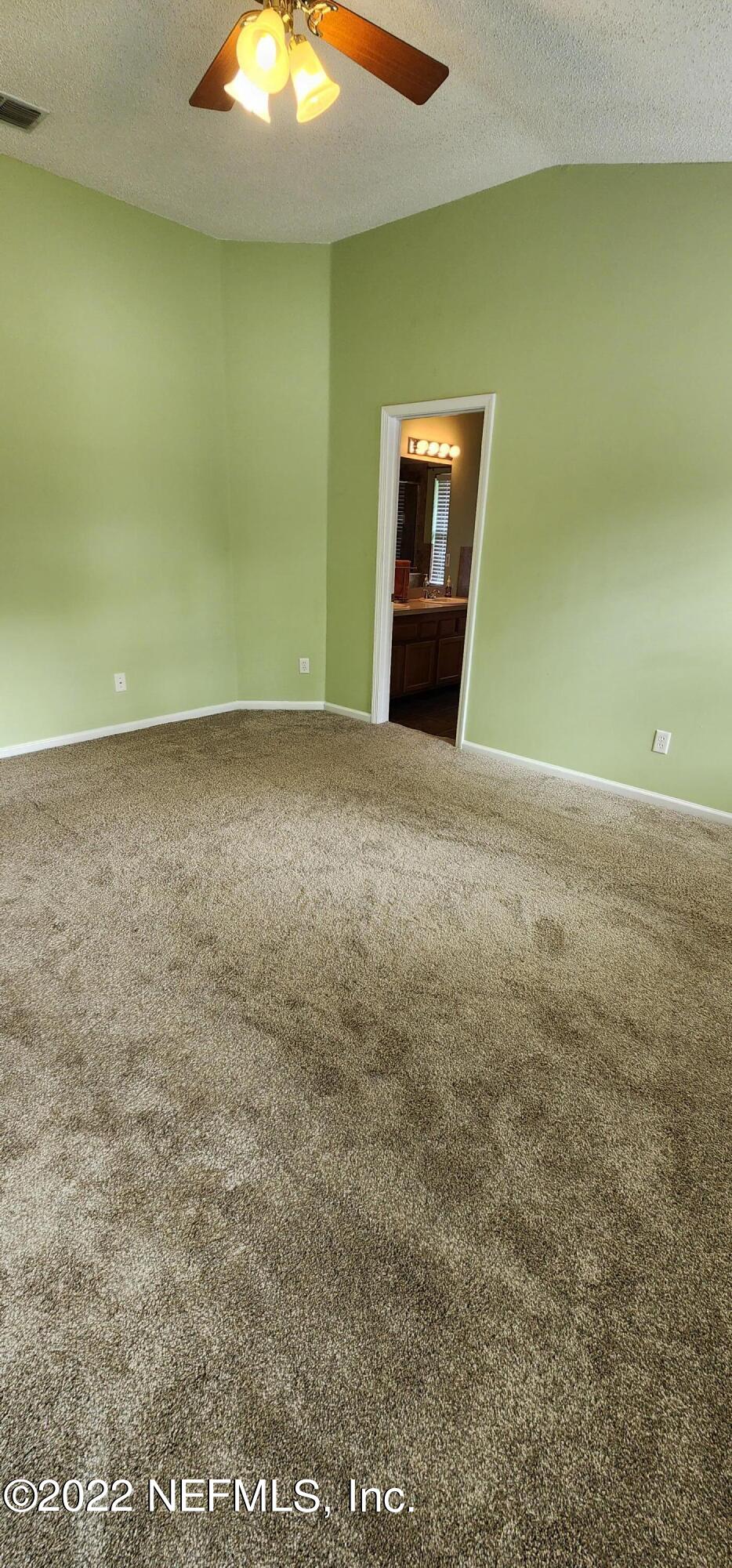 1641 Spring Oaks Lane Jacksonville, FL 32221 - Photo 40 of 40 view of empty room with a fireplace