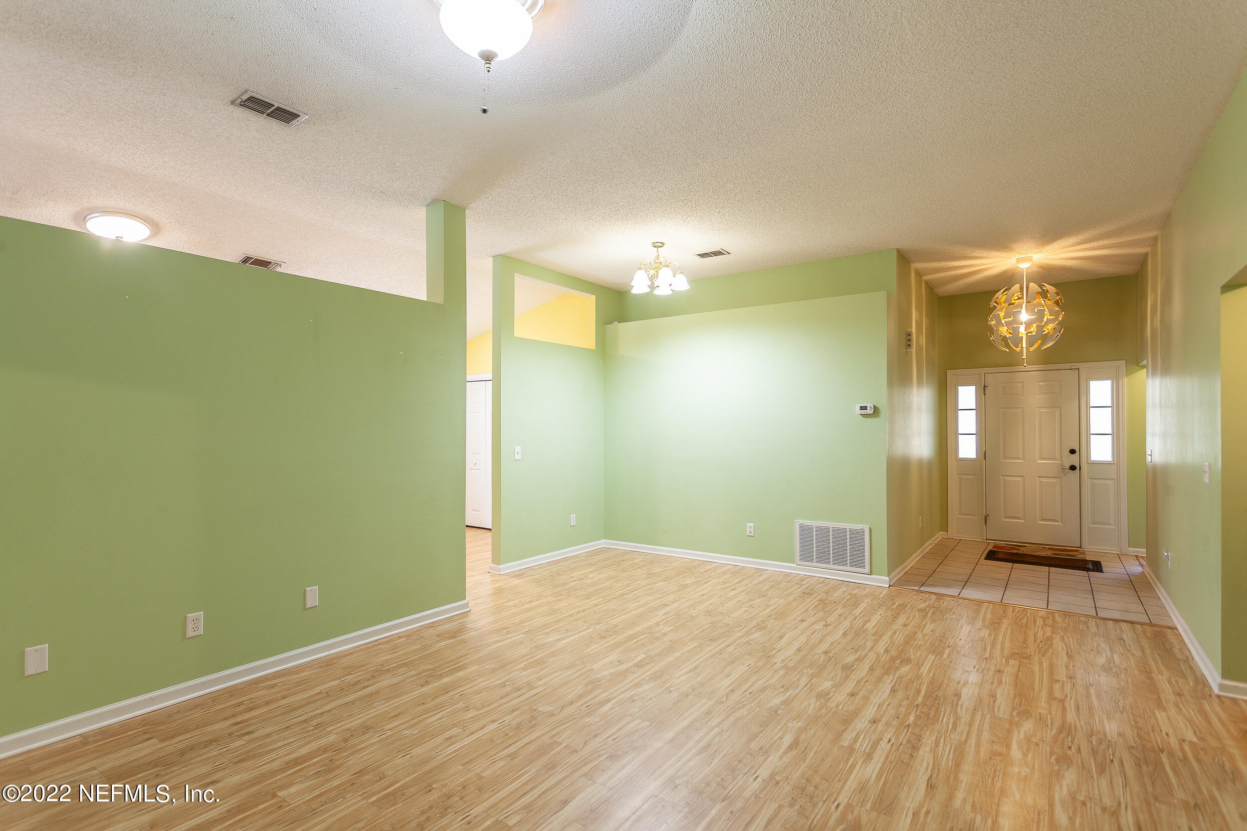 1641 Spring Oaks Lane Jacksonville, FL 32221 - Photo 8 of 40 a view of a big room with wooden floor