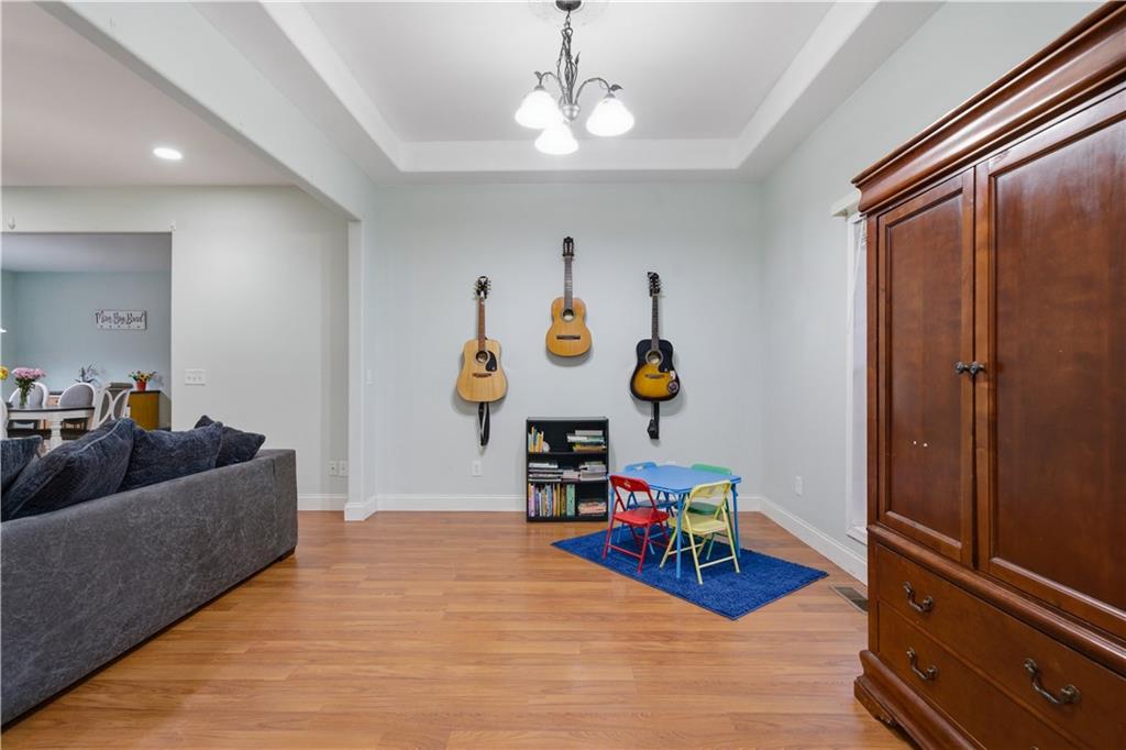323 Lloyd Way Resaca, GA 30735 - Photo 12 of 43 a living room with furniture and wooden floor