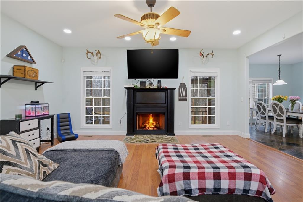 323 Lloyd Way Resaca, GA 30735 - Photo 14 of 43 a living room with furniture and a flat screen tv