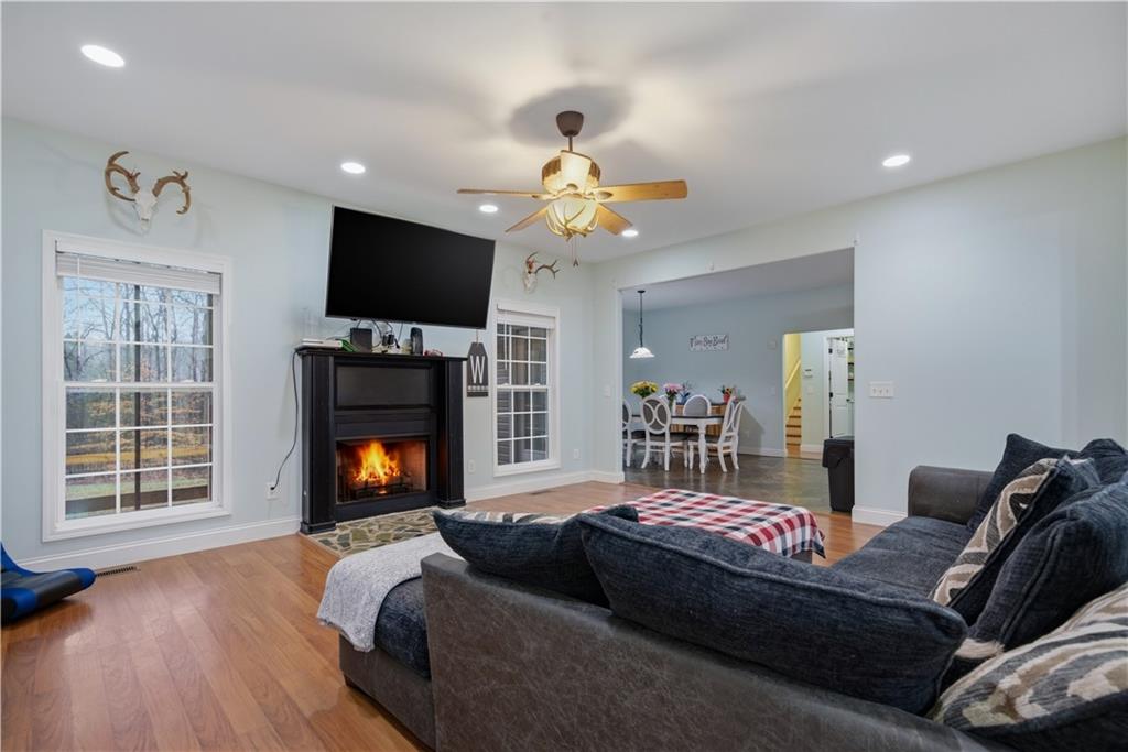 323 Lloyd Way Resaca, GA 30735 - Photo 16 of 43 a living room with furniture fireplace and flat screen tv