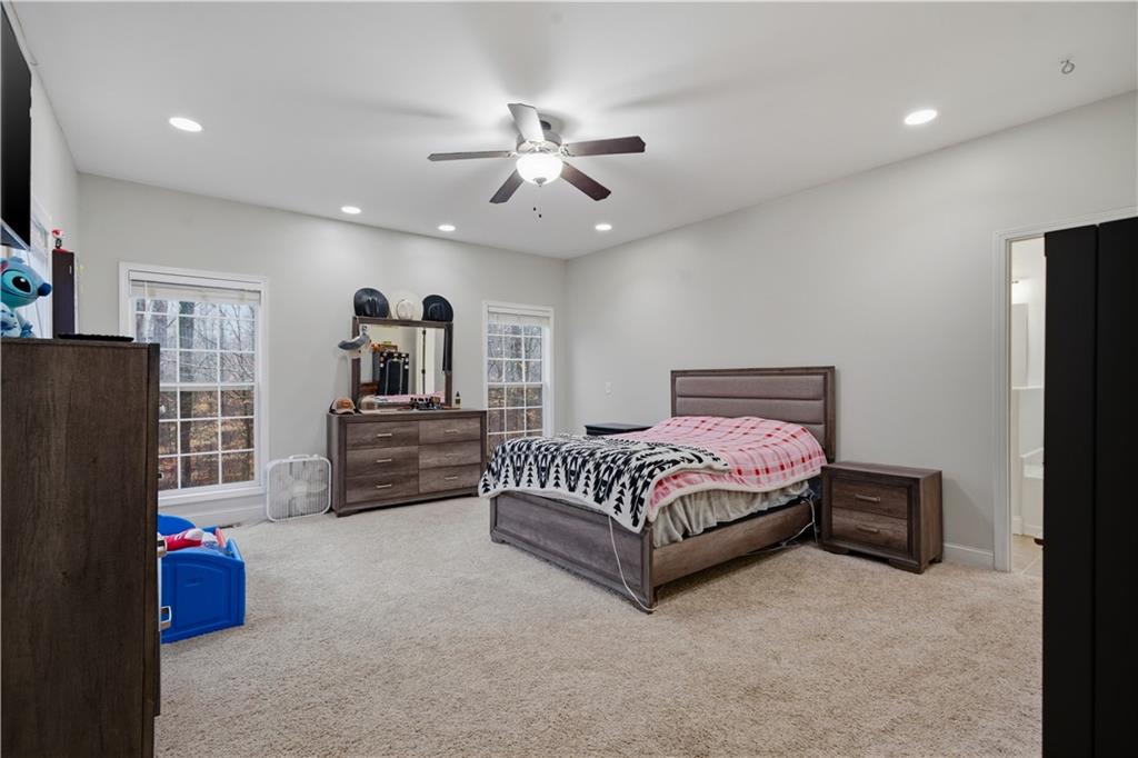 323 Lloyd Way Resaca, GA 30735 - Photo 22 of 43 a living room with furniture and a flat screen tv