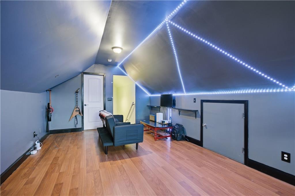 323 Lloyd Way Resaca, GA 30735 - Photo 29 of 43 a living room with furniture and a wooden floor