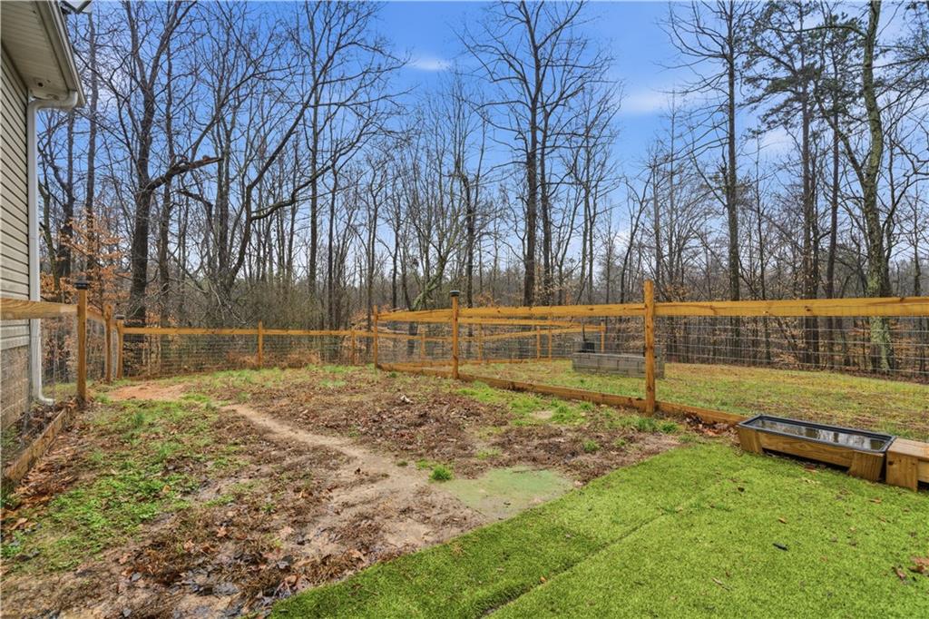 323 Lloyd Way Resaca, GA 30735 - Photo 35 of 43 a view of backyard with green space