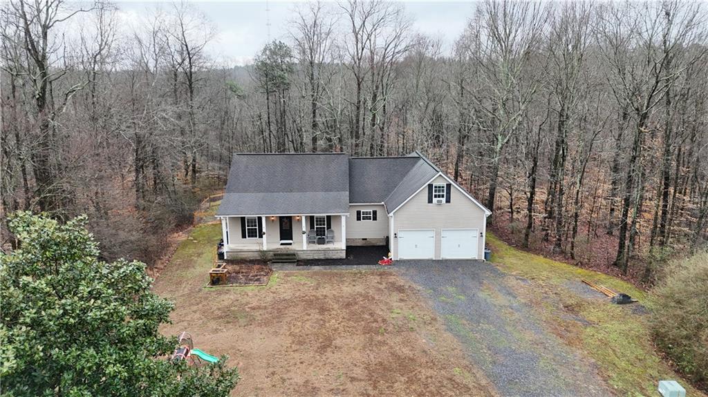 323 Lloyd Way Resaca, GA 30735 - Photo 39 of 43 front view of a house with a dry yard