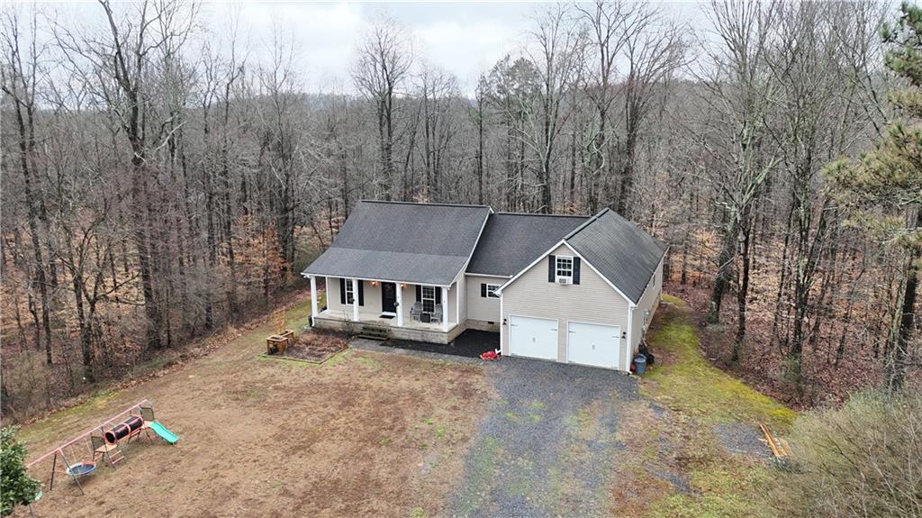 323 Lloyd Way Resaca, GA 30735 - Photo 40 of 43 front view of a house with a yard