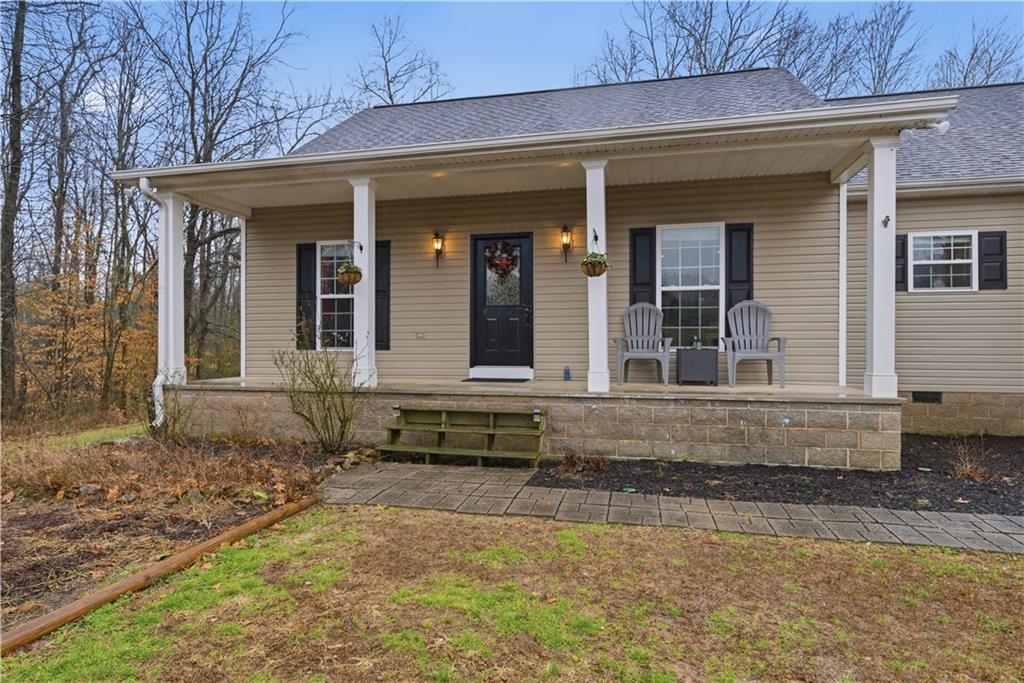 323 Lloyd Way Resaca, GA 30735 - Photo 41 of 43 a front view of a house with a yard