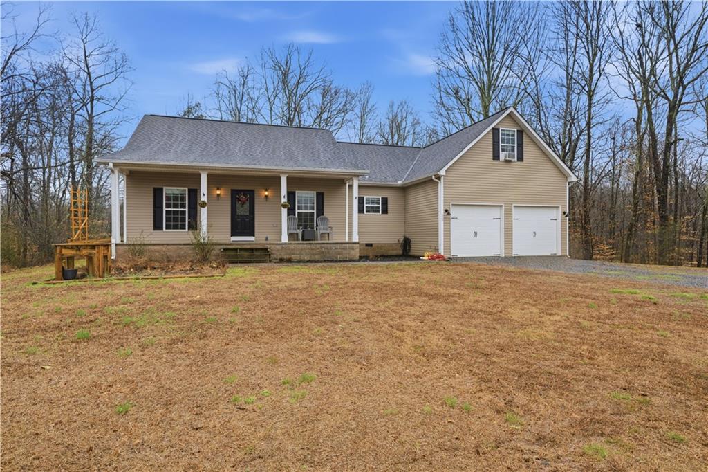 323 Lloyd Way Resaca, GA 30735 - Photo 43 of 43 front view of a house with a yard