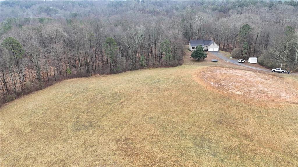 323 Lloyd Way Resaca, GA 30735 - Photo 9 of 43 a view of a backyard of the house