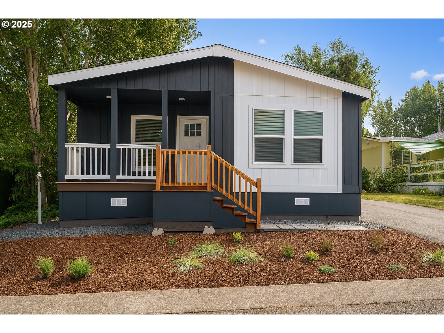 631 East Ellendale Avenue, Unit 206 Dallas, OR 97338 - Photo 1 of 30 a view of a house with a yard