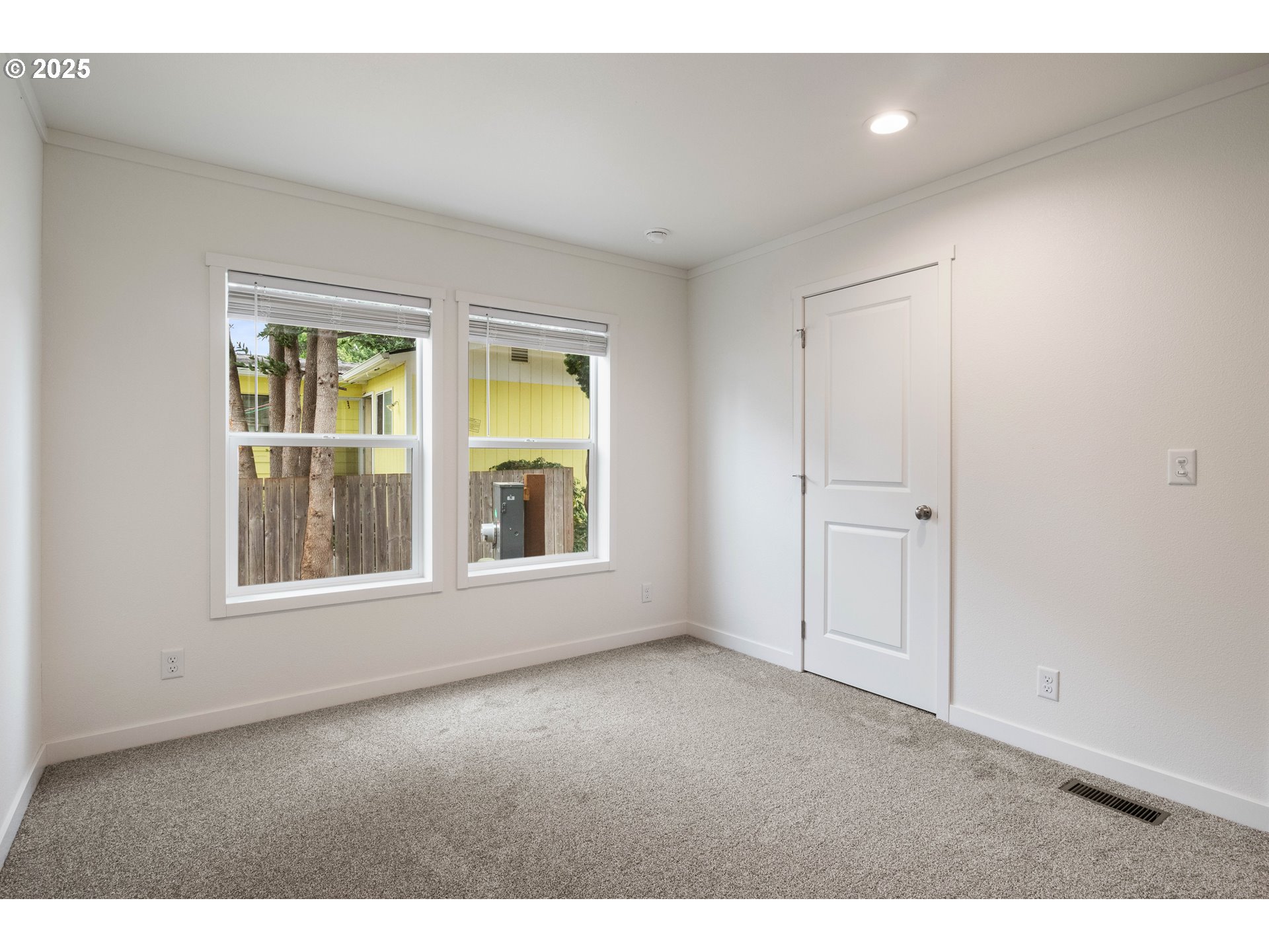 631 East Ellendale Avenue, Unit 206 Dallas, OR 97338 - Photo 26 of 30 a view of an empty room with a window