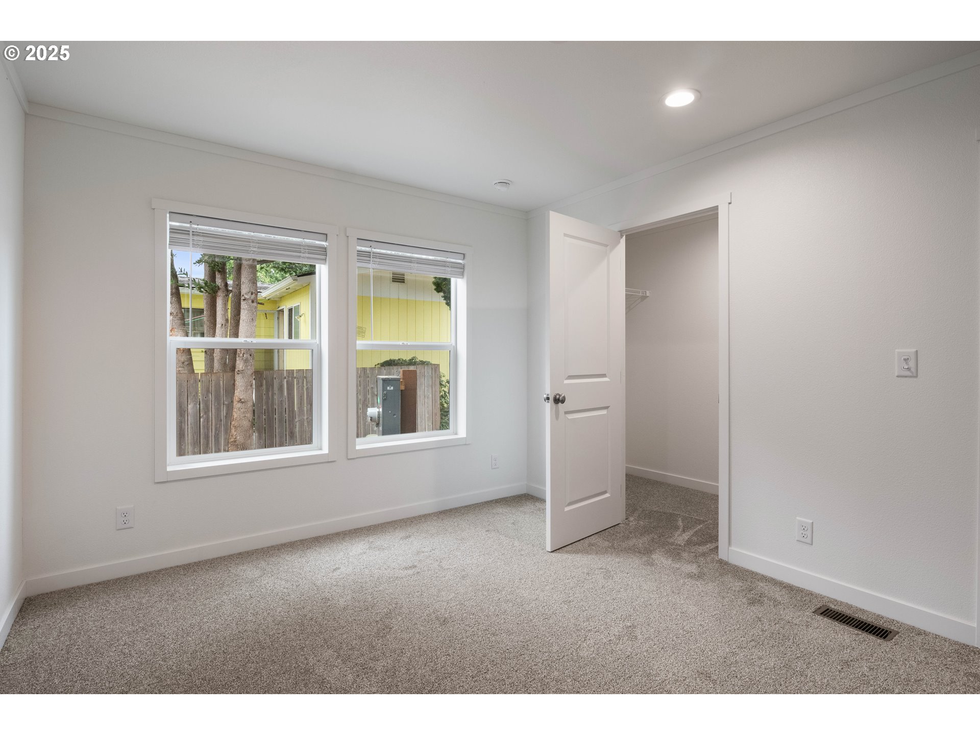 631 East Ellendale Avenue, Unit 206 Dallas, OR 97338 - Photo 27 of 30 an empty room with windows and closet
