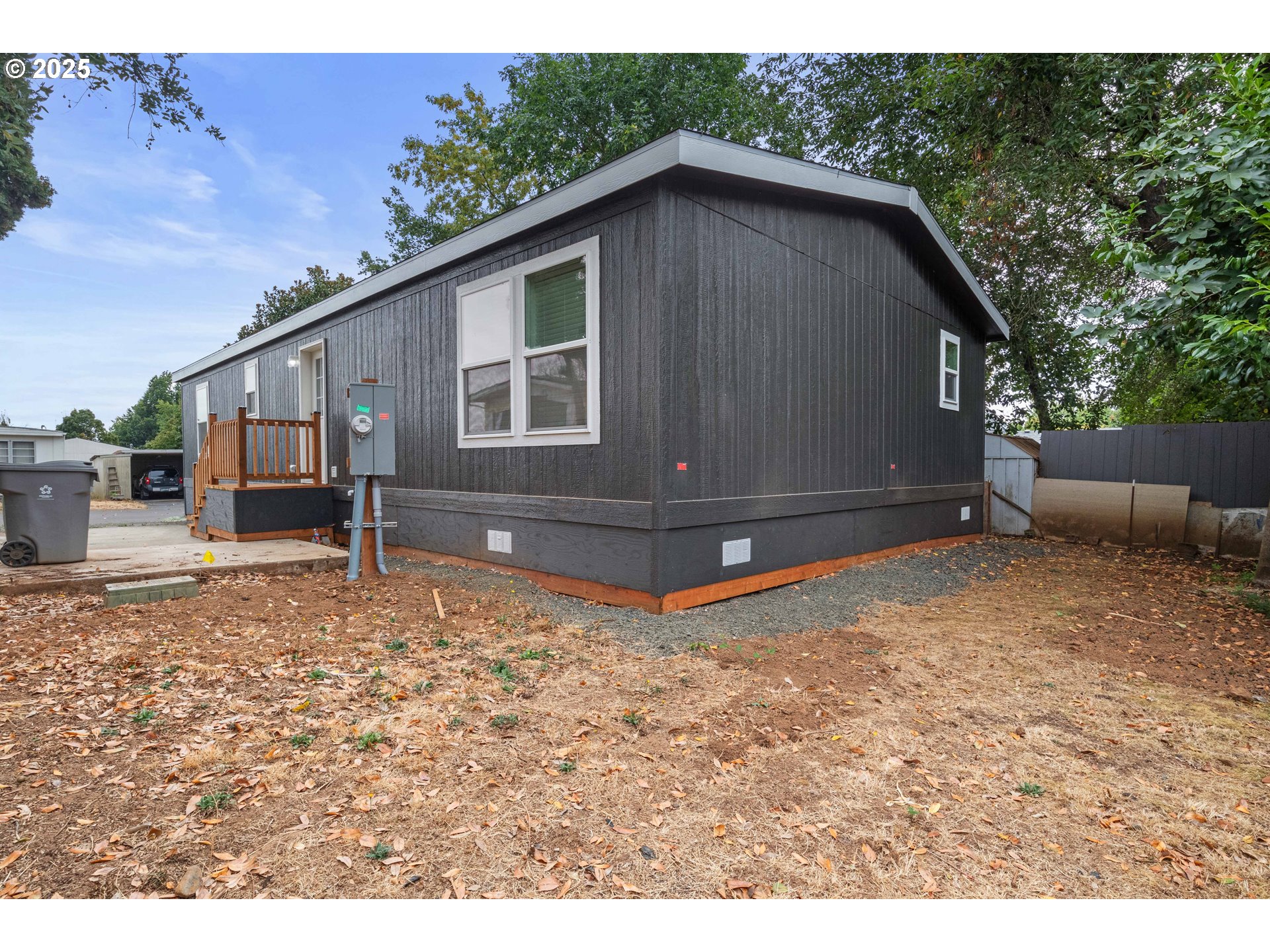 631 East Ellendale Avenue, Unit 206 Dallas, OR 97338 - Photo 29 of 30 a backyard of a house with lots of green space