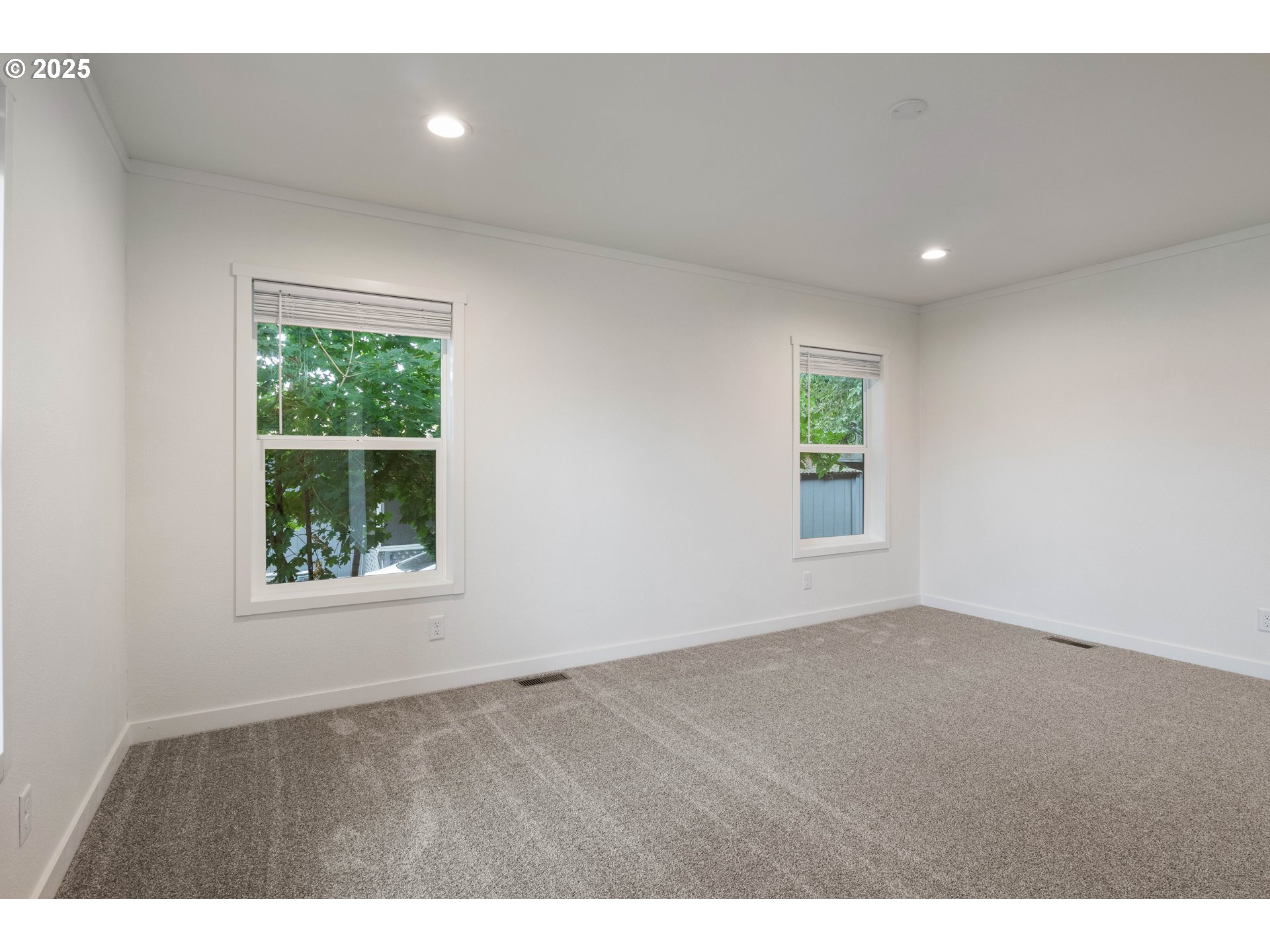 631 East Ellendale Avenue, Unit 206 Dallas, OR 97338 - Photo 5 of 30 a view of an empty room with a window