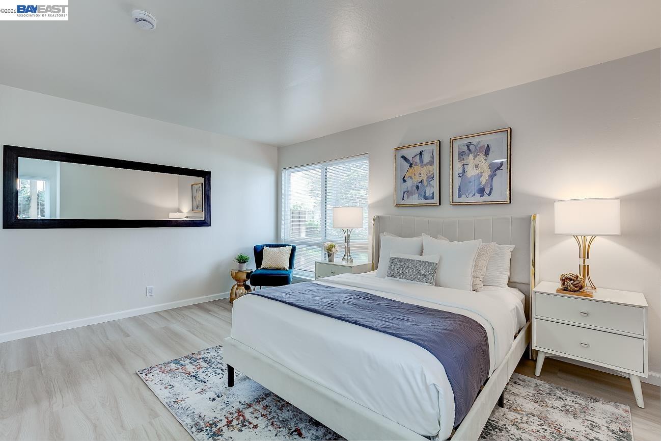9005 Alcosta Boulevard, Unit 199 San Ramon, CA 94583 - Photo 41 of 57 a bedroom with bed and a window