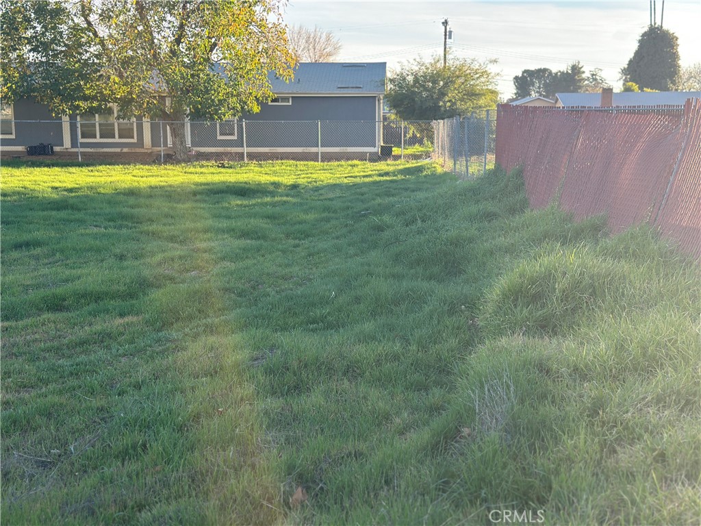 1 Cherry Beaumont, CA 92223 - Photo 4 of 14 a swimming pool with outdoor seating and yard