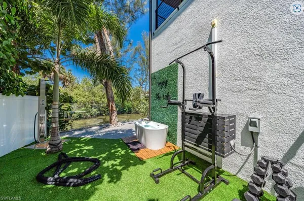 a view of outdoor space yard deck patio and outdoor kitchen