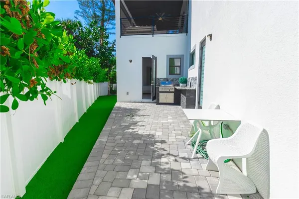a kitchen with stainless steel appliances a stove and a refrigerator