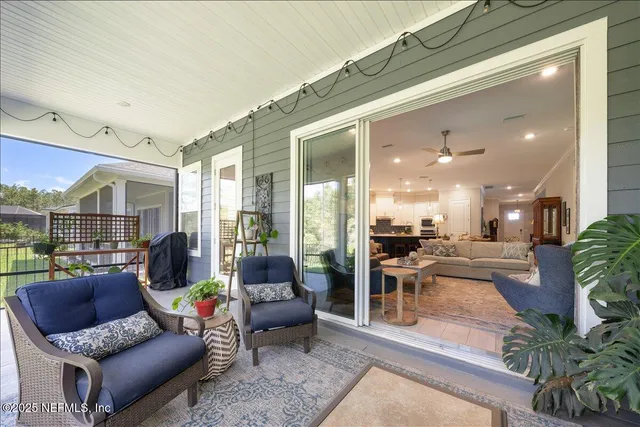 a living room with furniture and a table