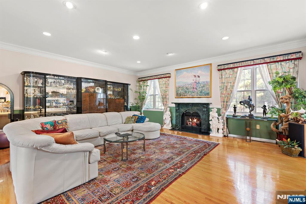 163 Rutherford Road Mahwah, NJ 07430 - Photo 11 of 33 a living room with furniture and a fireplace