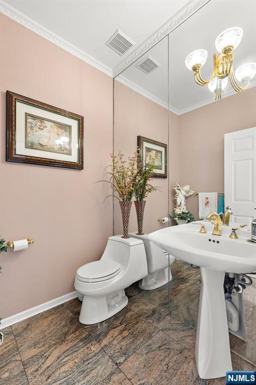 163 Rutherford Road Mahwah, NJ 07430 - Photo 17 of 33 a bathroom with a sink toilet and a mirror
