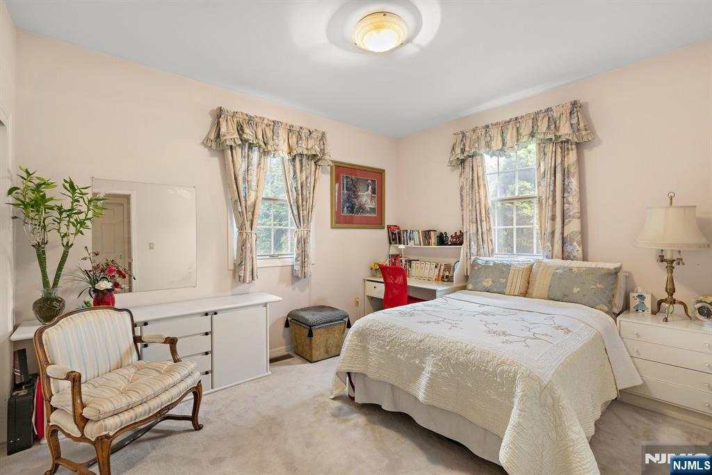 163 Rutherford Road Mahwah, NJ 07430 - Photo 21 of 33 a bed room with a bed and a chair