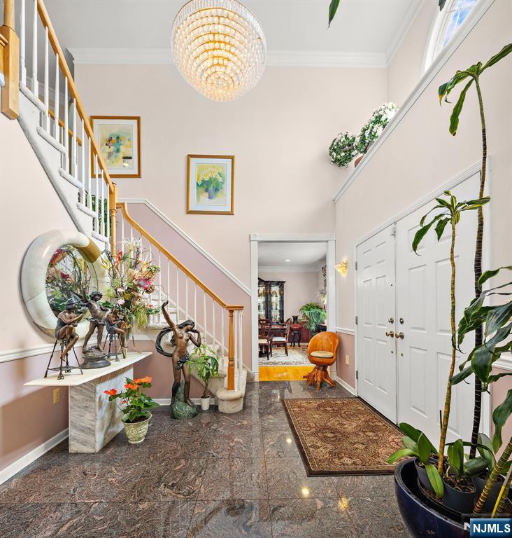 163 Rutherford Road Mahwah, NJ 07430 - Photo 8 of 33 a view of an entryway with wooden floor