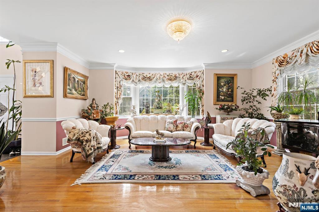 163 Rutherford Road Mahwah, NJ 07430 - Photo 9 of 33 a living room with furniture and a large window