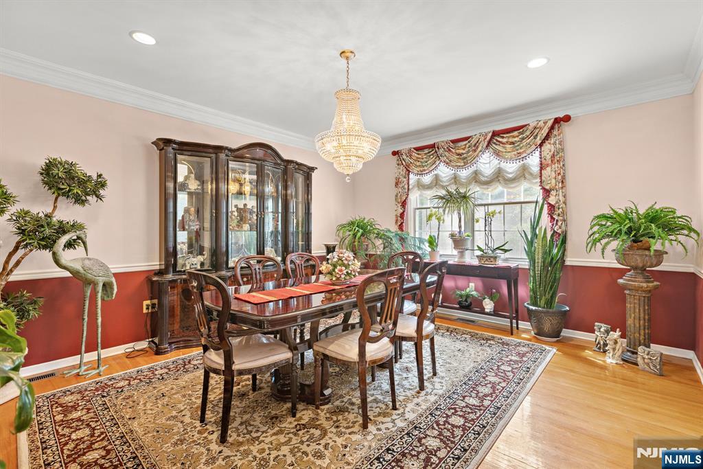 163 Rutherford Road Mahwah, NJ 07430 - Photo 10 of 33 a view of a dining room with furniture window and wooden floor