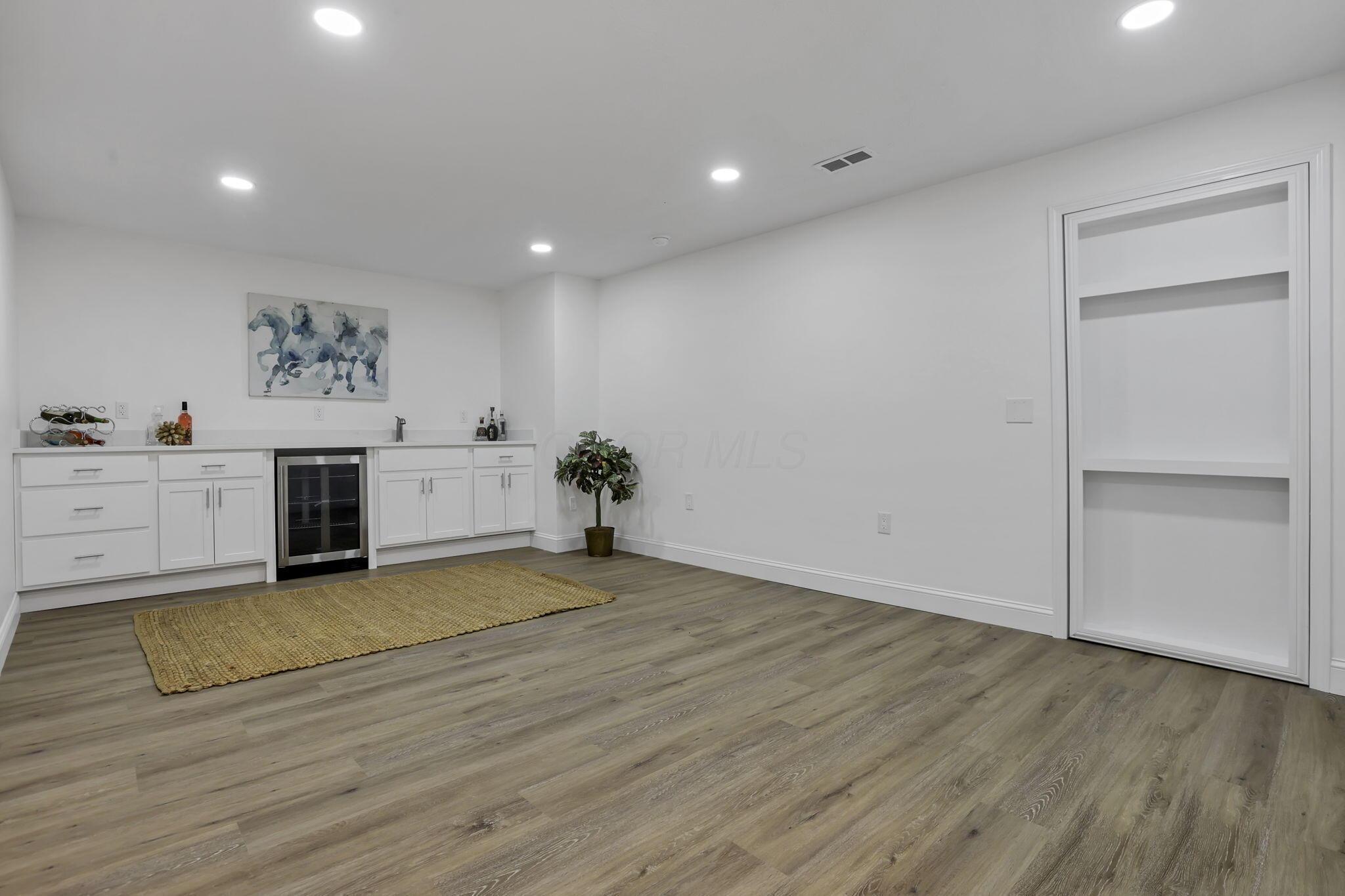 6769 Ludwig-Dresback Road Circleville, OH 43113 - Photo 47 of 70 The Downstairs Rec Room will be Your Cinema Space