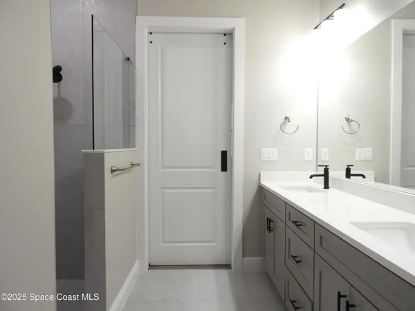 a bathroom with a sink a toilet and a bathtub